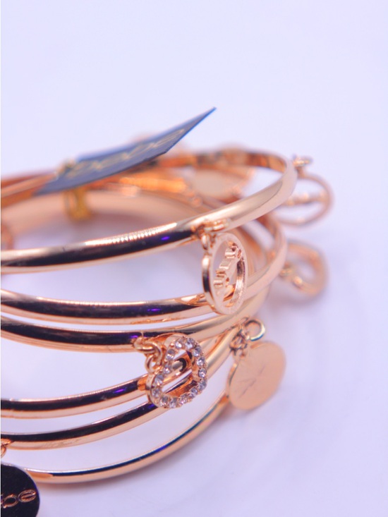 bebe Gold tone Multi-Charm Bangle Set - Picture 3 of 6